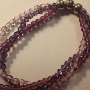 Handcrafted 3 strand bracelet with a twist